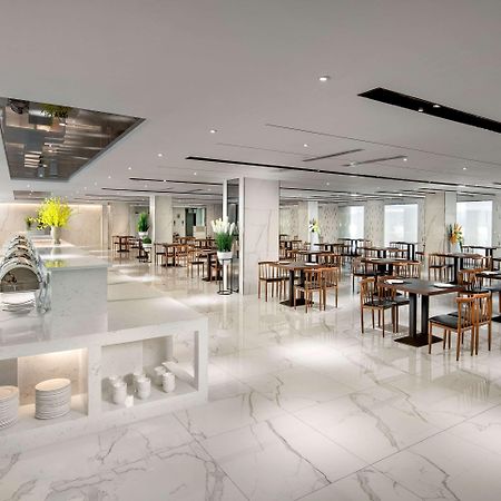 Ramada By Wyndham Mengzi Suites Esterno foto