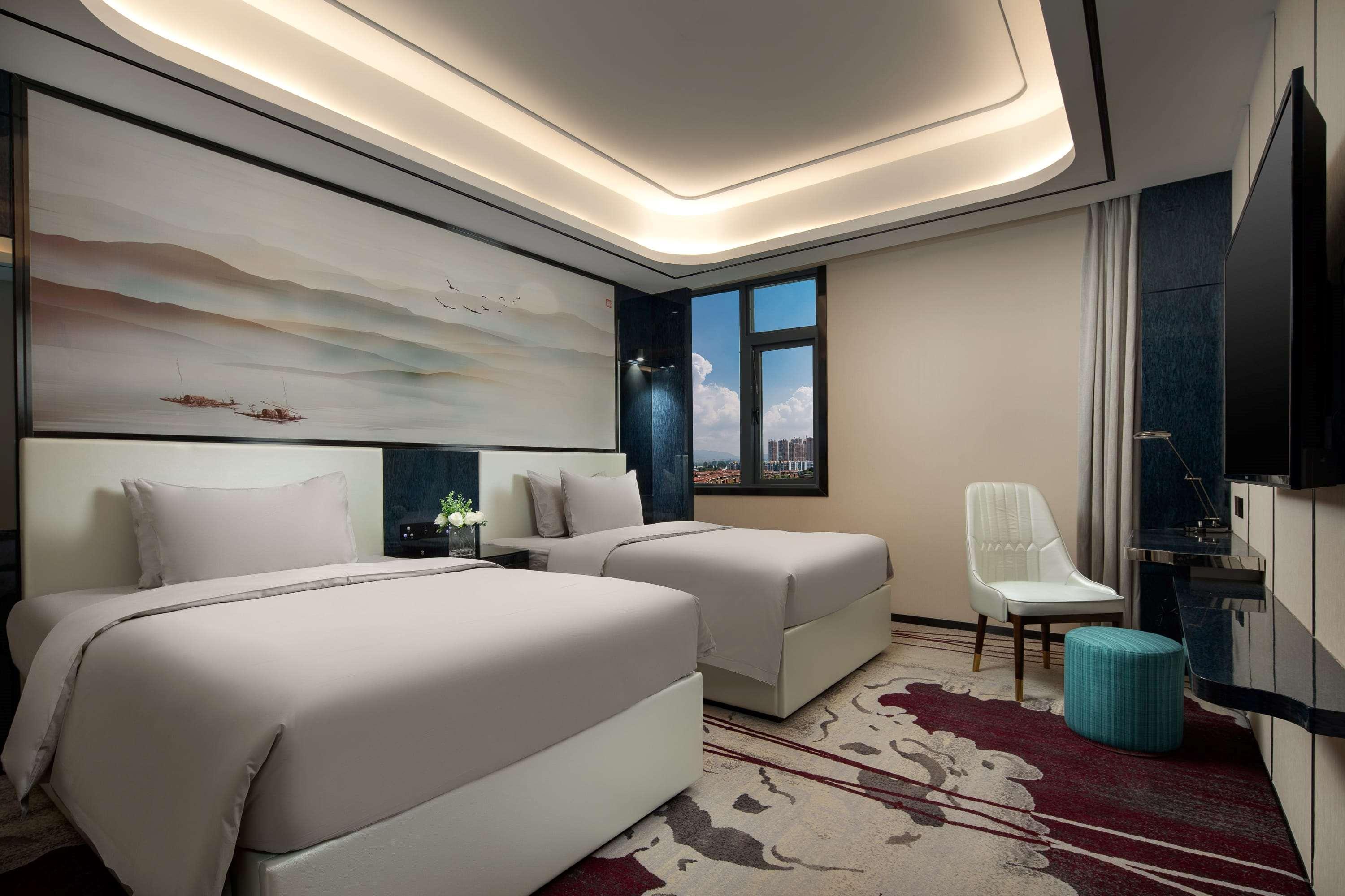 Ramada By Wyndham Mengzi Suites Esterno foto
