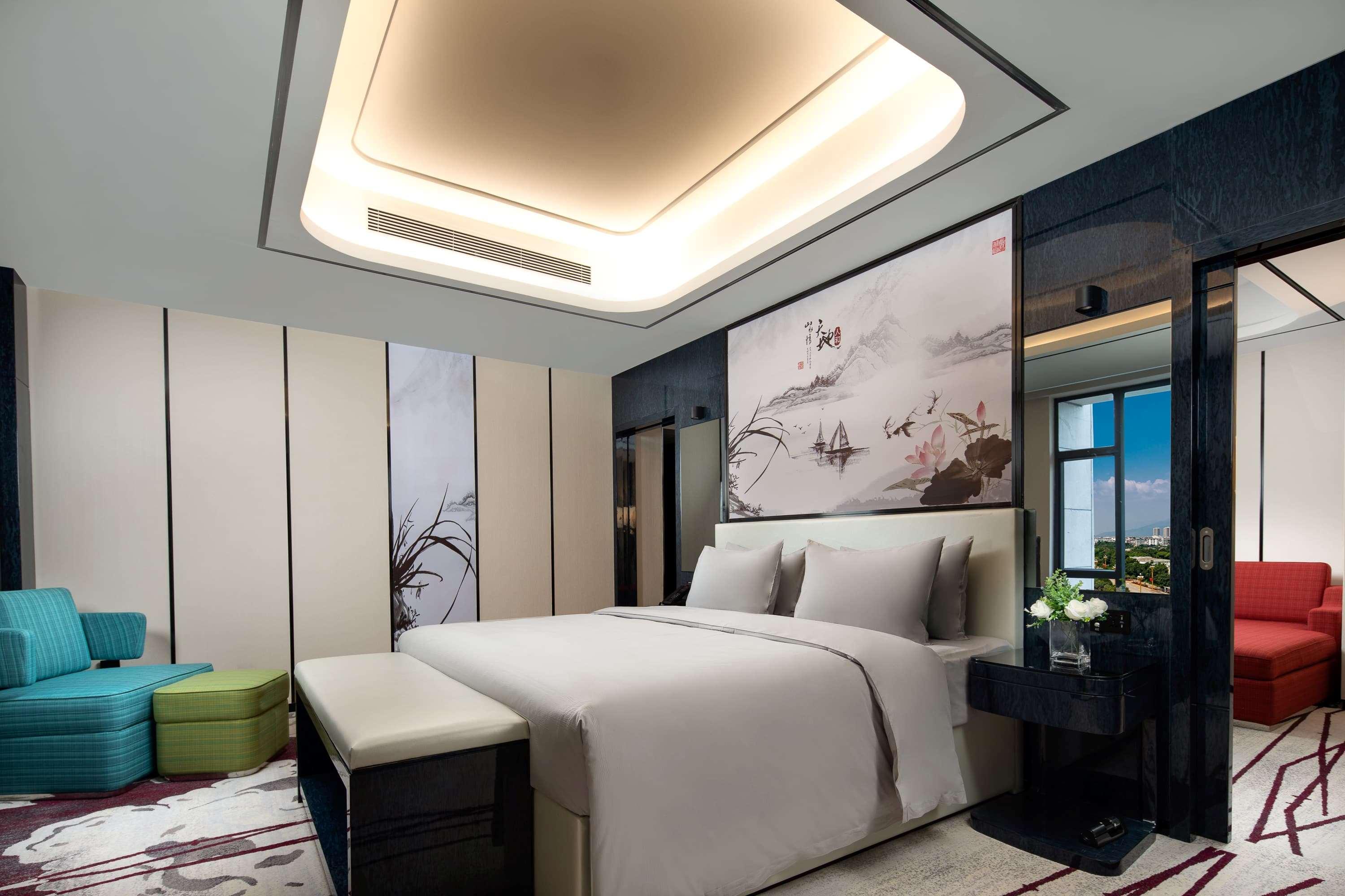 Ramada By Wyndham Mengzi Suites Esterno foto
