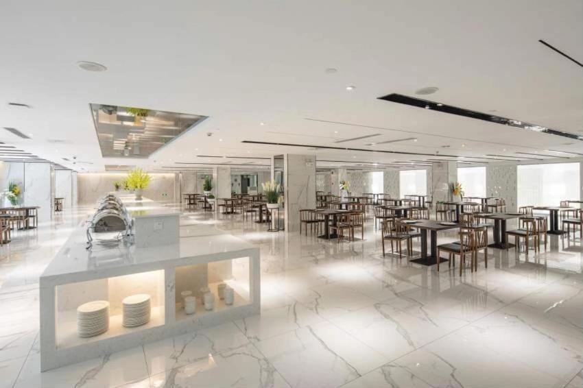 Ramada By Wyndham Mengzi Suites Esterno foto